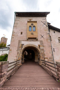 Low angle view of historic building against sky