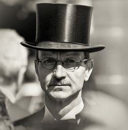 Close-up portrait of man wearing hat