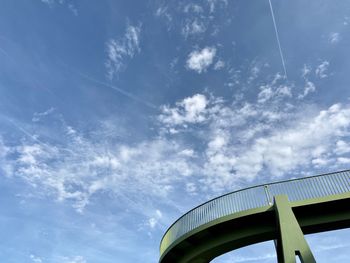 Low angle view of bridge against blue sky