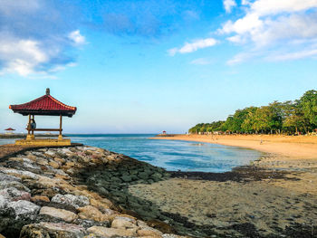 Scenic view of beach against sky