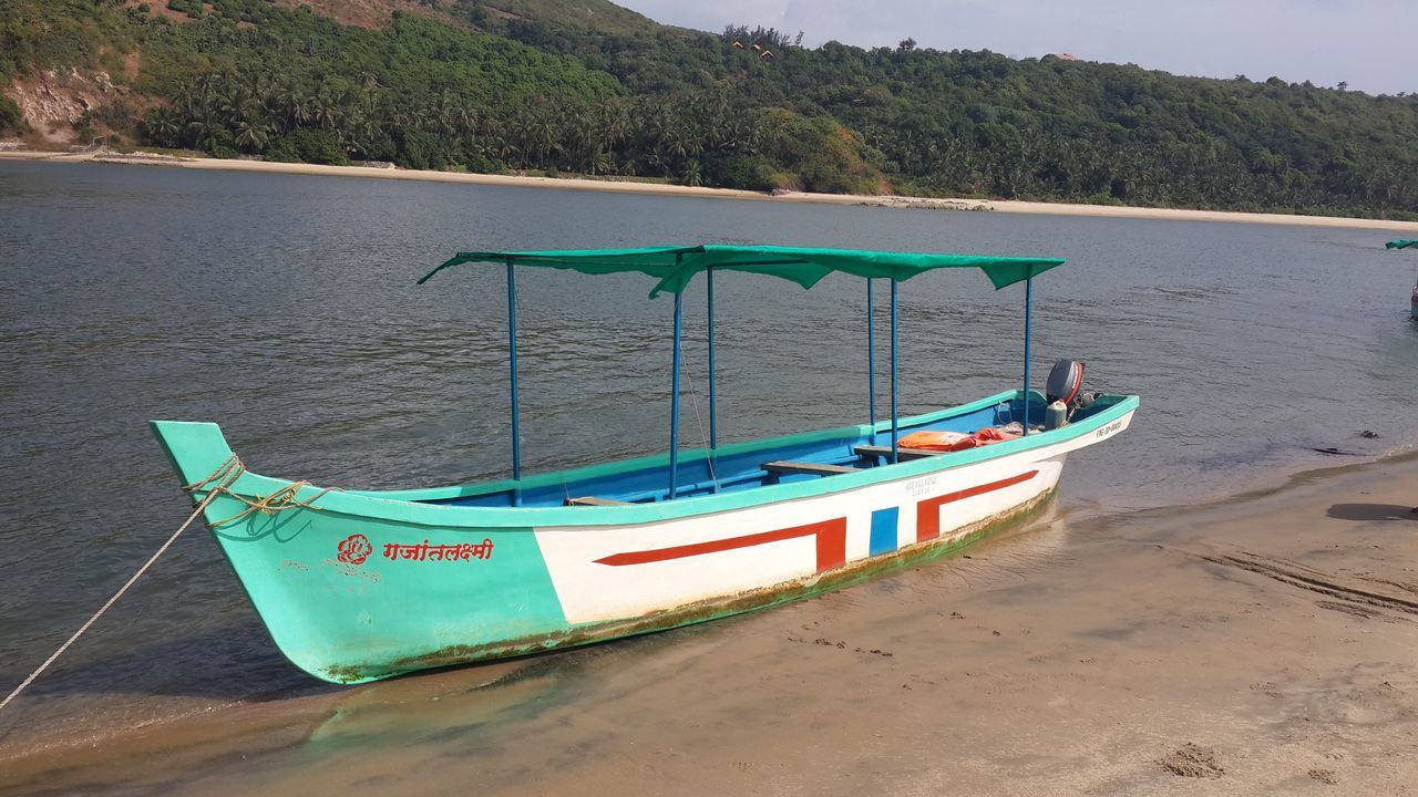 nautical vessel, transportation, mode of transport, moored, water, nature, day, outdoors, pedal boat, beauty in nature, no people, scenics, beach