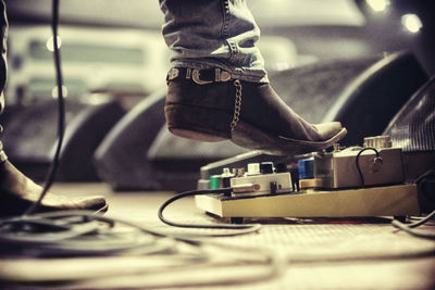 Midsection of man working on table