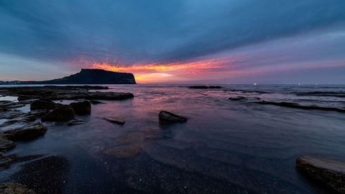 Scenic view of sea against sky during sunset