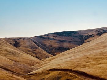 Scenic view of mountains against clear sky