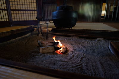 High angle view of burning fire on floor