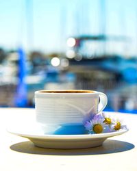 Close-up of coffee cup on table