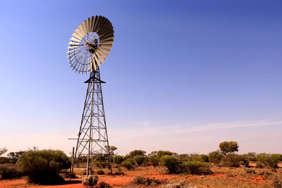 Built structure on field against clear sky