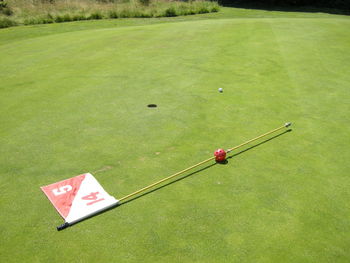 High angle view of flag on golf course