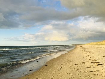 Scenic view of beach against sky