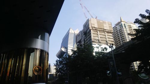 Low angle view of skyscrapers against sky