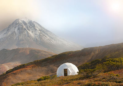 Glamping on volcano in kamchatka peninsula in sun light