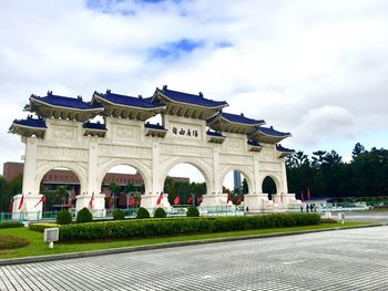 Facade of historic building against sky