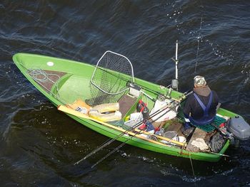 High angle view of fishing boat in lake