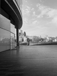 Bridge over river with buildings in background