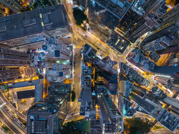 High angle view of buildings in city at night