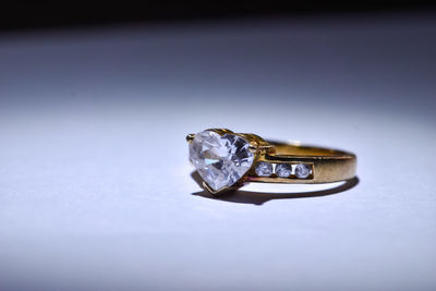 Close-up of wedding rings on white background