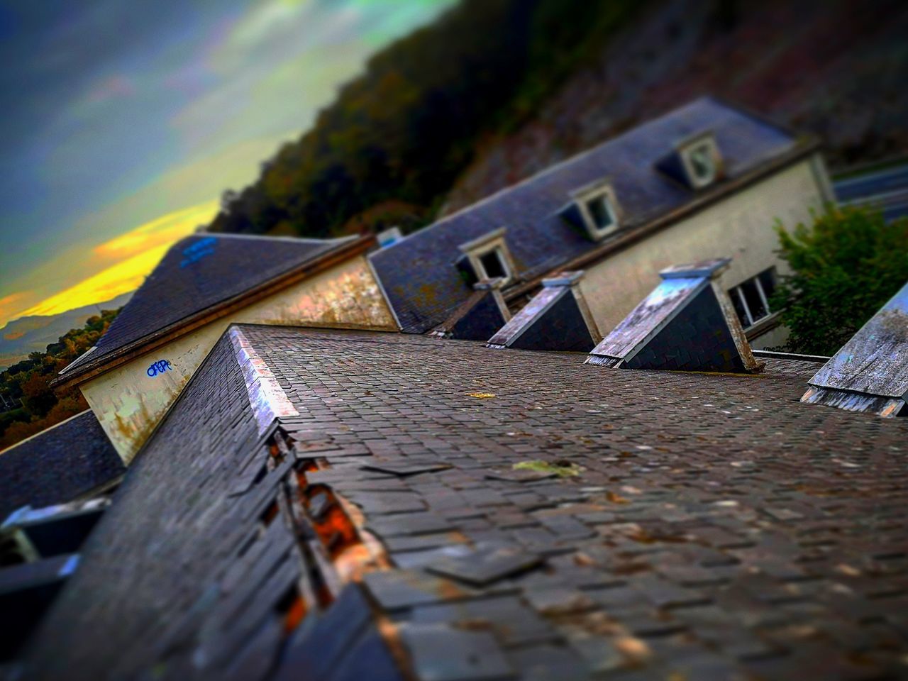 selective focus, architecture, built structure, no people, building exterior, nature, wood - material, day, outdoors, sky, cloud - sky, building, metal, low angle view, old, water, sunset, close-up, house, tilt-shift