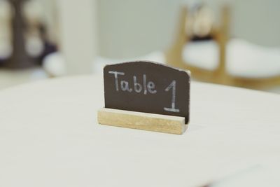 Close-up of text on table