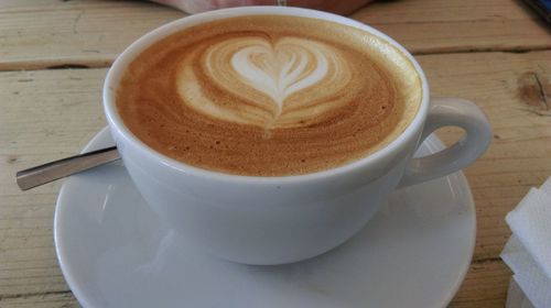 High angle view of cappuccino on table