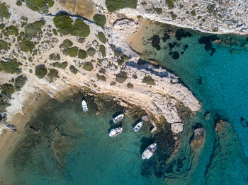 High angle view of sea seen through rocks