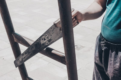 Low section of man working