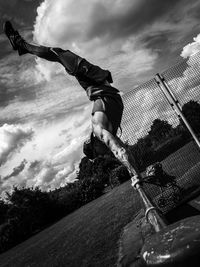 Low angle view of man against sky