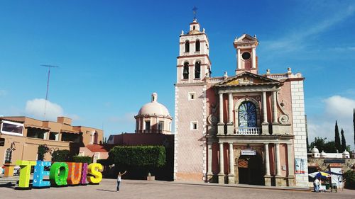 Facade of church against blue sky