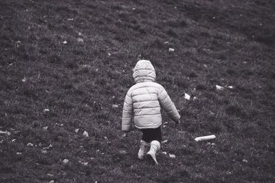 Girl standing on field