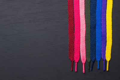 High angle view of multi colored wool on table