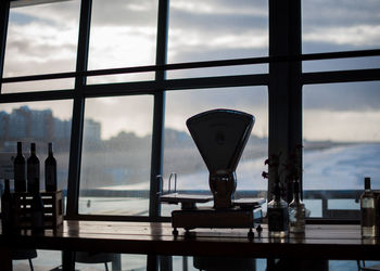 Equipment on table against sky during sunset