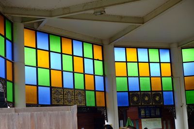 Multi colored glass window in building