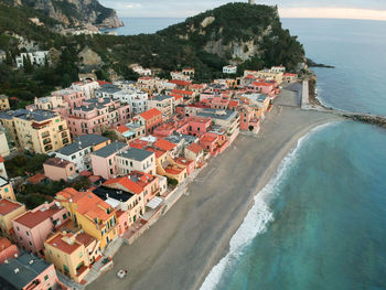 High angle view of townscape by sea