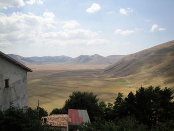 Scenic view of mountains against sky