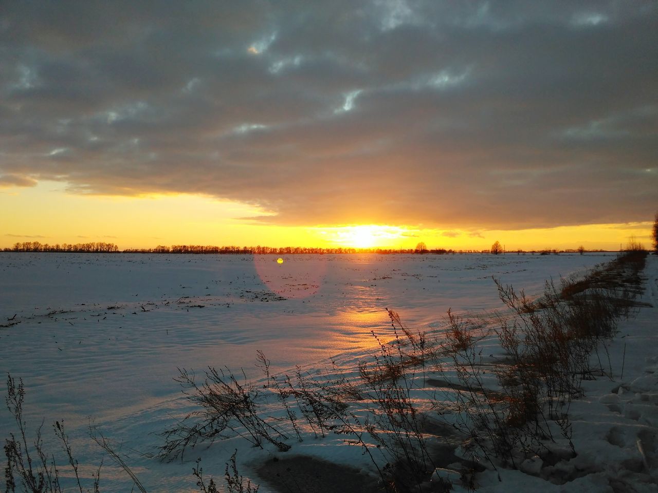 sunset, water, nature, sky, reflection, tranquility, beauty in nature, outdoors, dramatic sky, no people, cloud - sky, sun, day