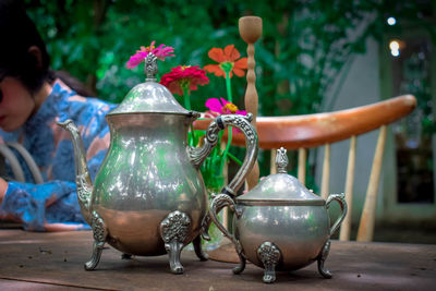 Close-up of containers on table