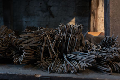 Close-up of rusty keys against wall
