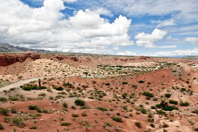 Scenic view of arid landscape against sky
