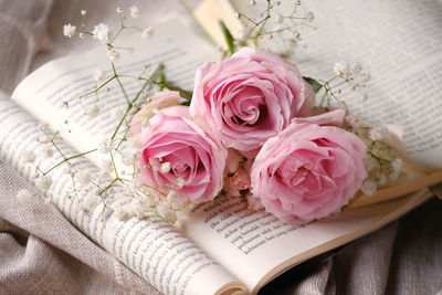 Midsection of woman holding bouquet