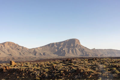 Scenic view of mountains against clear sky