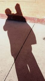 Shadow of man on wall