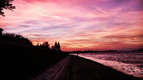 Scenic view of sea at sunset