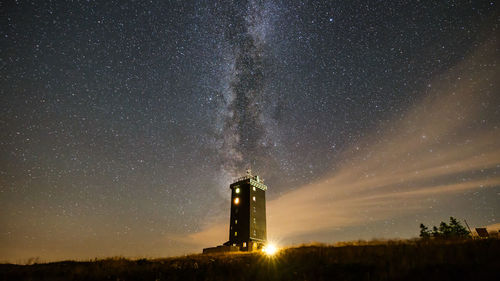 Scenic view of sea against sky at night