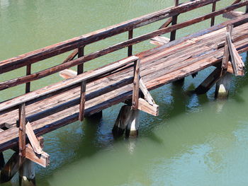 High angle view of wooden pier over lake