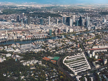 High angle view of crowd and buildings in city