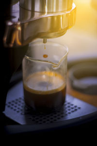 Close-up of coffee cup on table