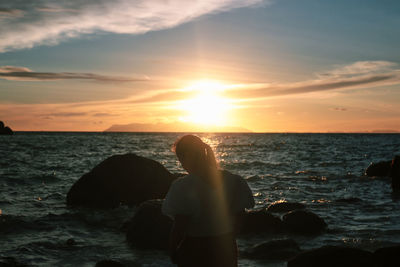 Scenic view of sea against sky during sunset