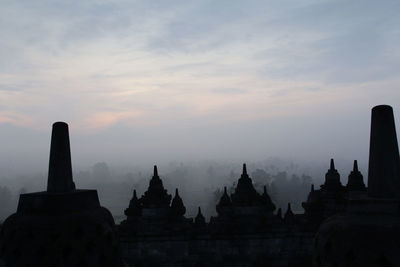 View of temple against sky during sunset