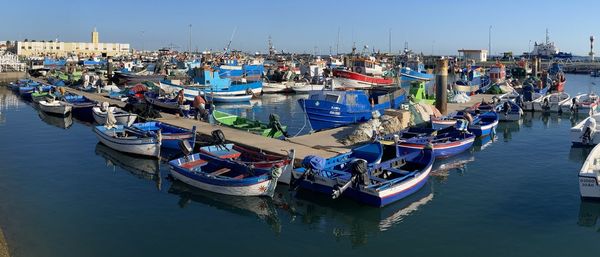 Boats moored in harbor