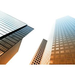 Low angle view of modern buildings against clear sky