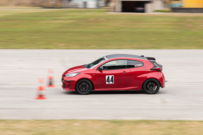 Ambri, ticino, switzerland, april 3, 2022 car test racing along the runway on the local airfield